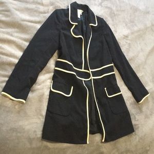 Black and cream colored blazer coat